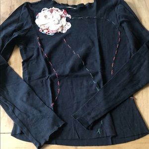 Black blouse with flower detail